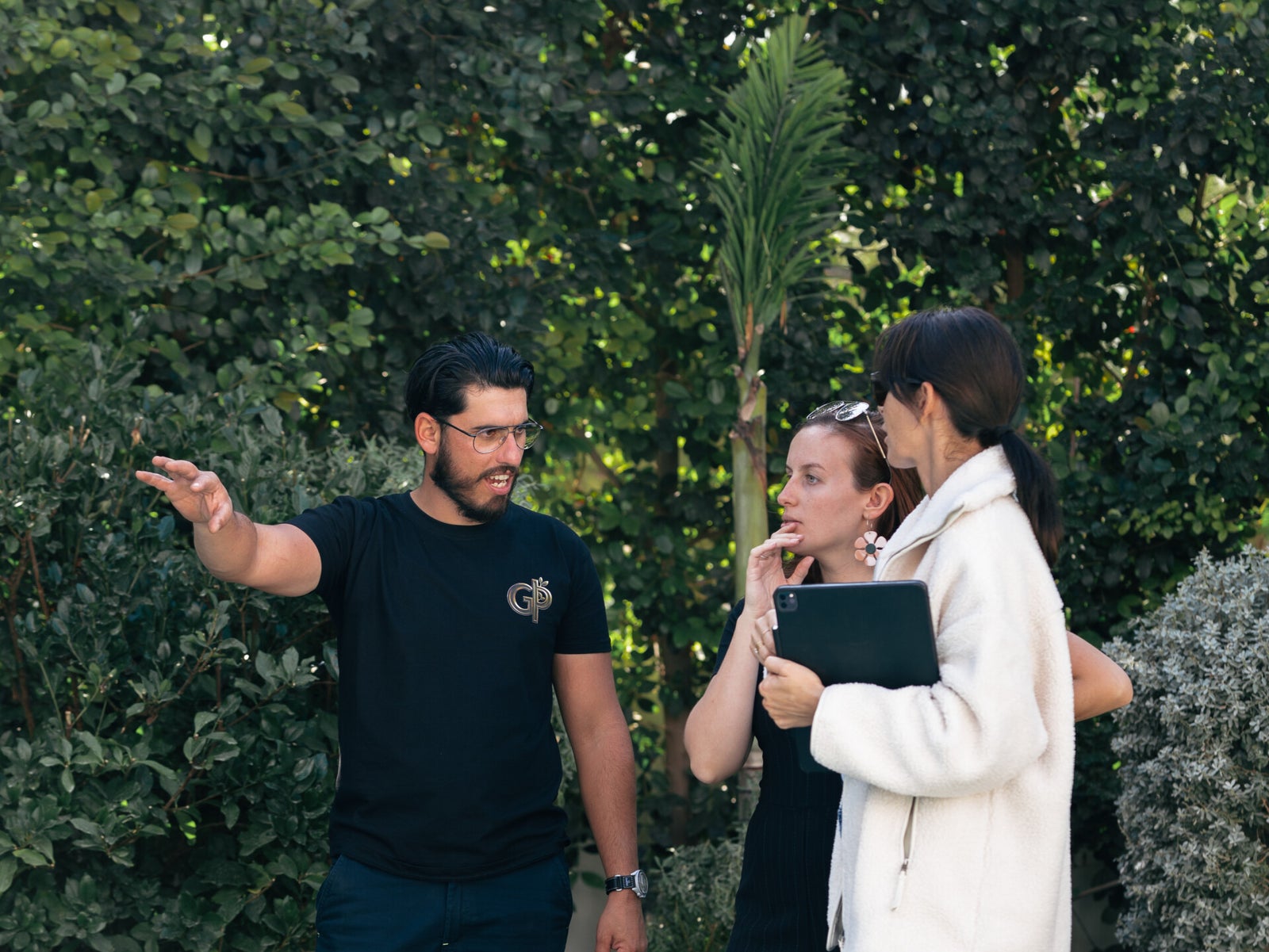 On-site garden consultation discussing layout, privacy and planting strategy